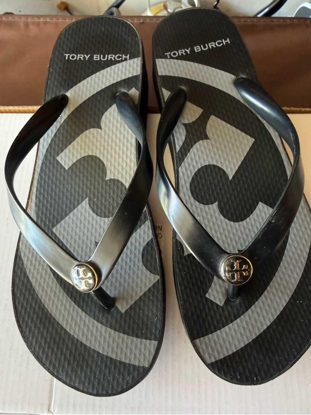 Tory Burch Black Logo Rubber Flip Flops with Gold Emblem